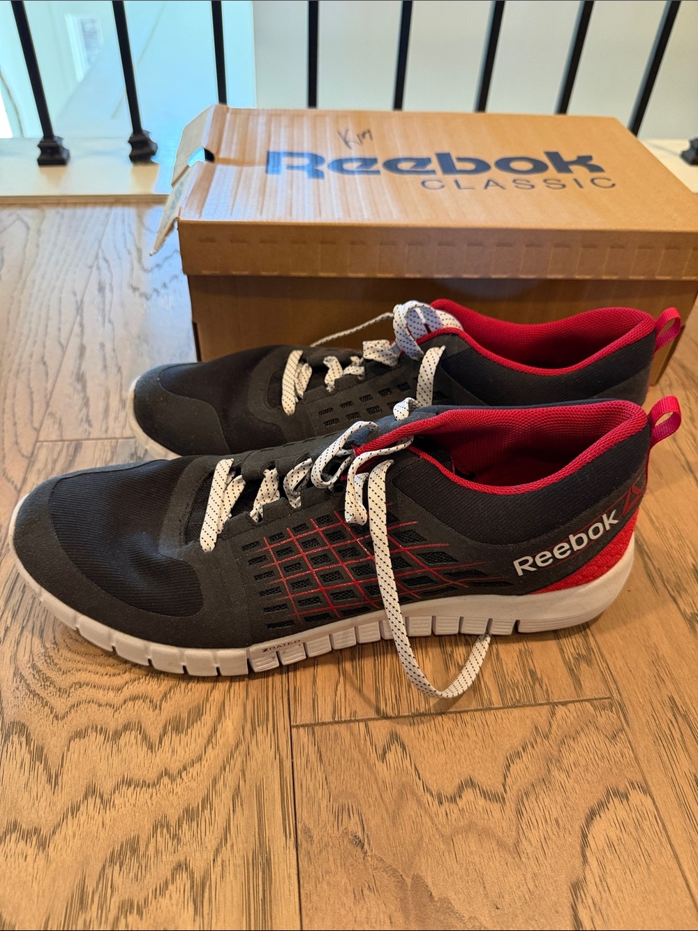 Reebok Men’s Black and Red Athletic Shoes with White Soles